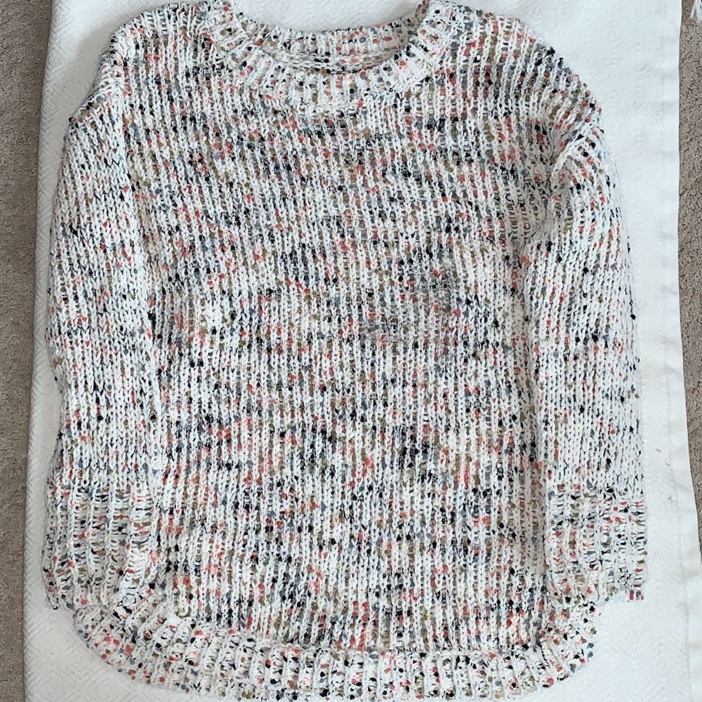 white and multi color knit sweater